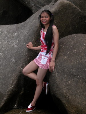 Solo model Bodacious Babette releases her large tits from a latex clothing